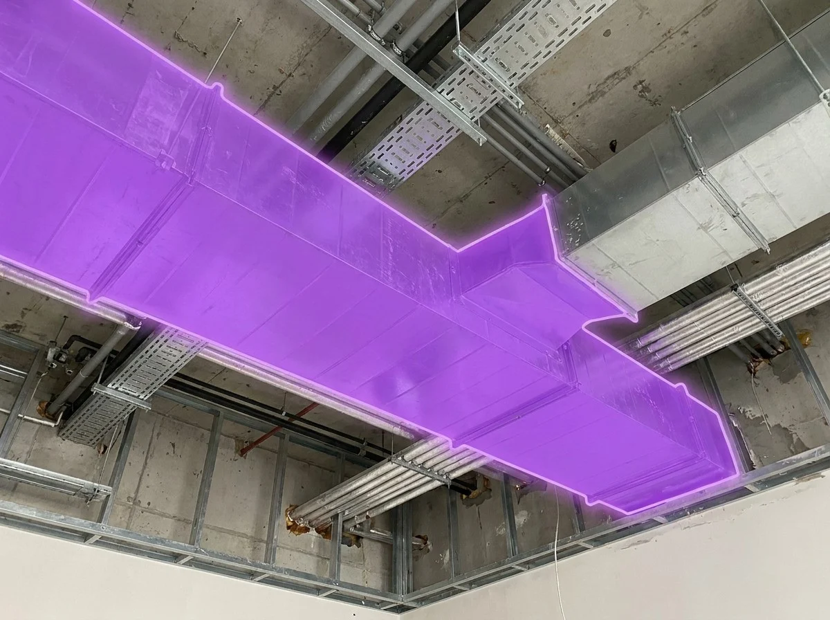 AI segmentation mask over exposed MEP pipes and ducts on a construction site