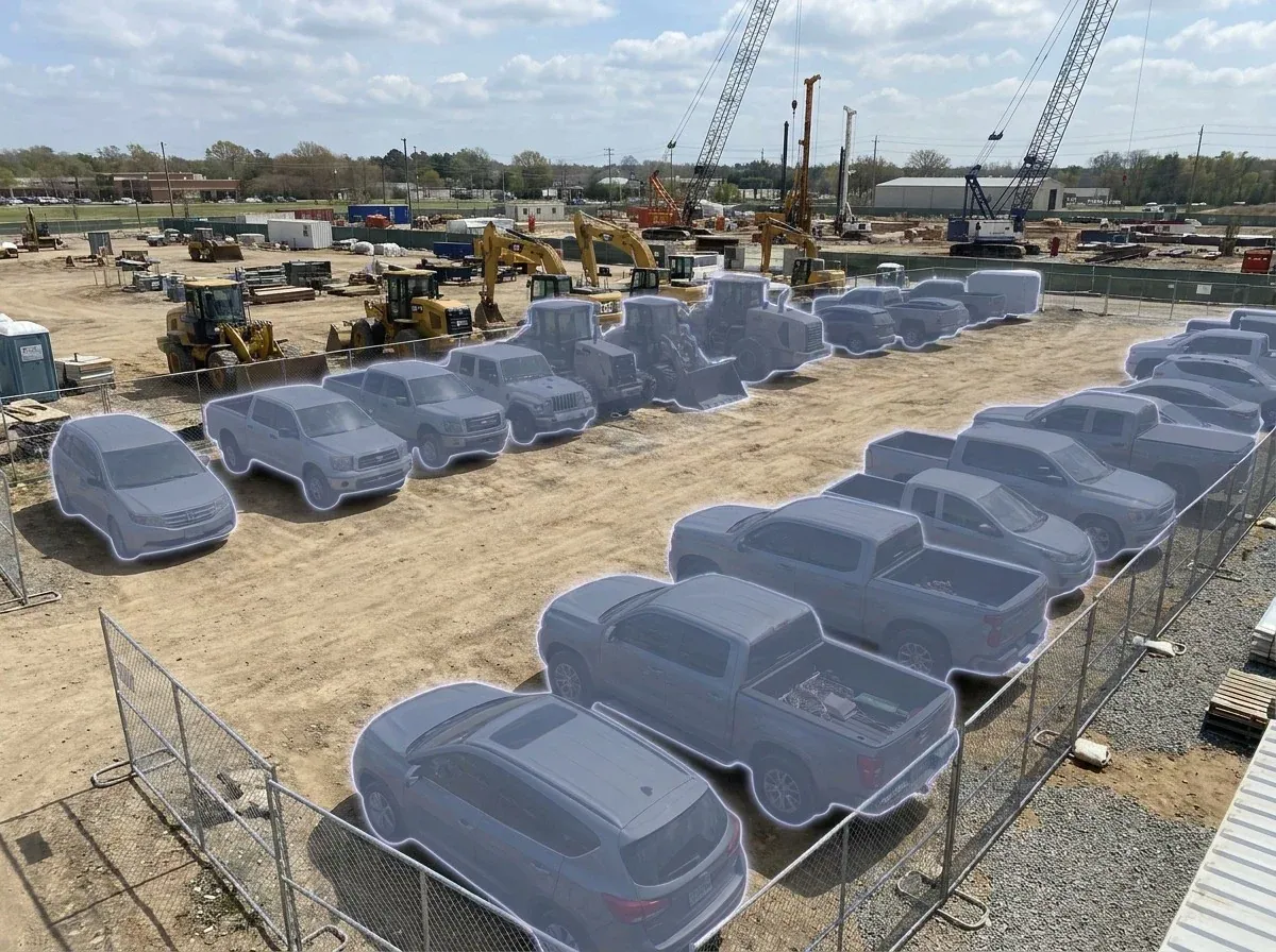 AI segmentation mask over a site parking area on a construction site