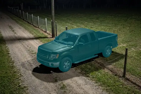 AI segmentation flagging a vehicle crossing the farm perimeter line after hours