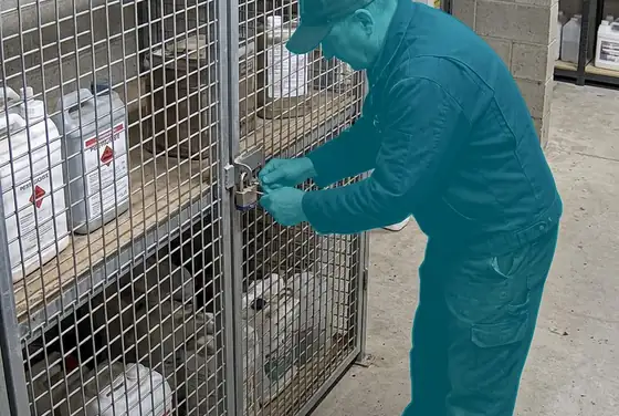 AI segmentation flagging an unauthorized worker opening a locked pesticide storage cage