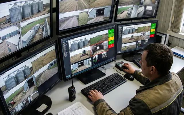 A site supervisor receiving a safety alert on a smartphone