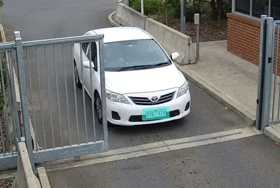 AI segmentation mask on a vehicle plate at the site gate