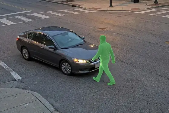 AI segmentation mask on a vehicle-pedestrian conflict