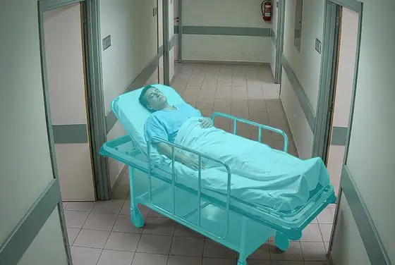 AI segmentation mask on a patient left alone on a stretcher, unattended patient detection