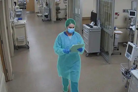 AI segmentation mask on a clinician in a COVID ward without a face shield
