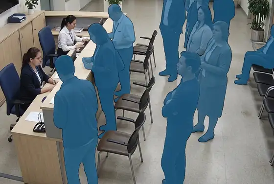 AI segmentation mask on people queuing in front of a registration desk
