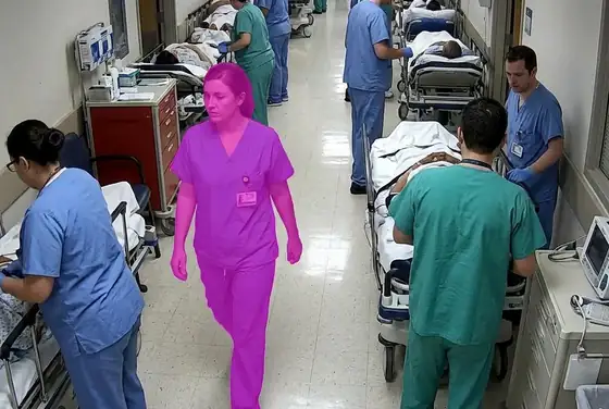 AI segmentation mask on a corridor crowded with stretchers and staff