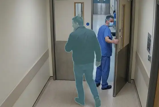 AI segmentation mask on tailgating through a staff-only operating-theatre door