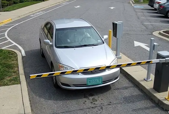 AI segmentation mask on a licence plate read at a hospital parking barrier, ANPR