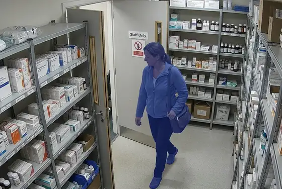 AI segmentation mask on a visitor crossing into a staff-only medication storage room
