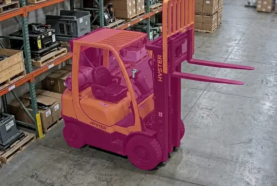 AI segmentation mask on a parked forklift left with the key in and the forks raised
