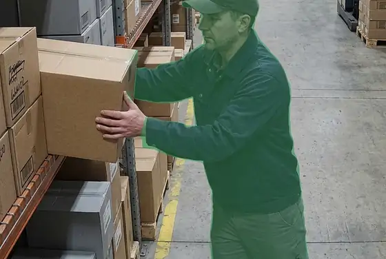 AI segmentation mask on a picker handling cartons with no safety gloves