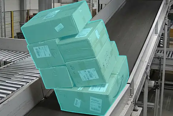 AI segmentation mask on a leaning stack of parcels on a sortation belt
