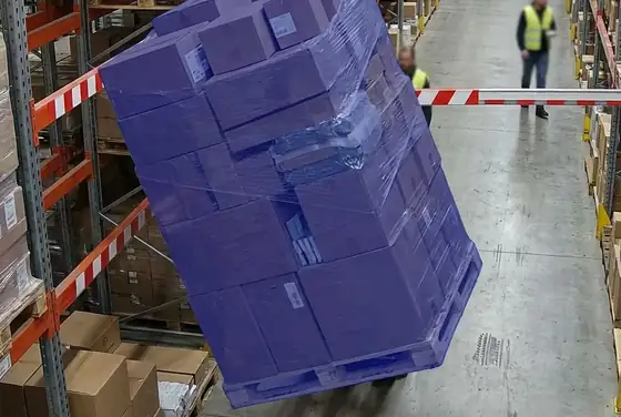 AI segmentation mask on a tilted pallet stacked above the safe height line