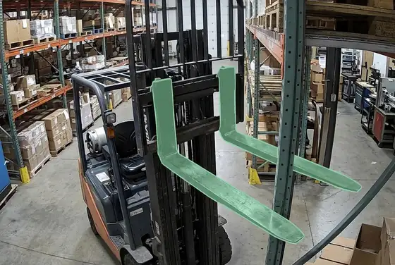 AI segmentation mask on a forklift fork poking into a rack upright