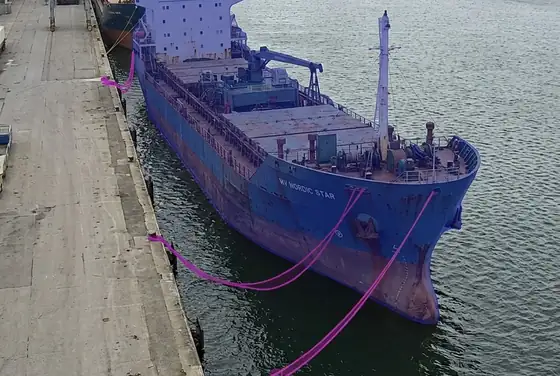 AI segmentation flagging loose mooring lines and a drifting vessel at a quay