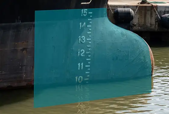 AI segmentation reading the vessel draft marks painted on the hull near the waterline