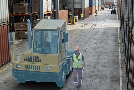 AI segmentation flagging a yard tractor close to a pedestrian worker in a stack lane