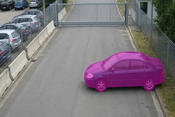 AI segmentation flagging a suspicious vehicle loitering near an exit gate