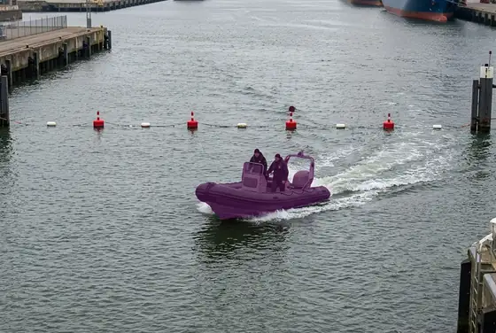 AI segmentation flagging an unauthorised small craft entering a no-entry port exclusion zone