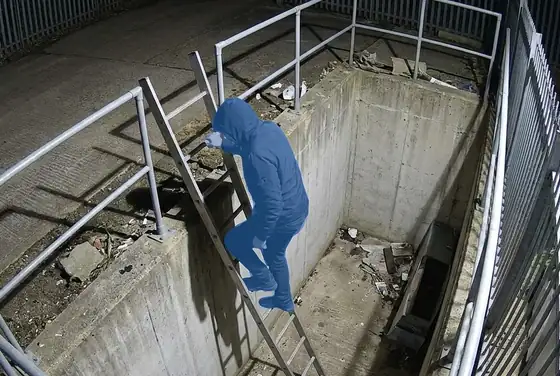 AI segmentation flagging an unauthorized person in a secured pit zone