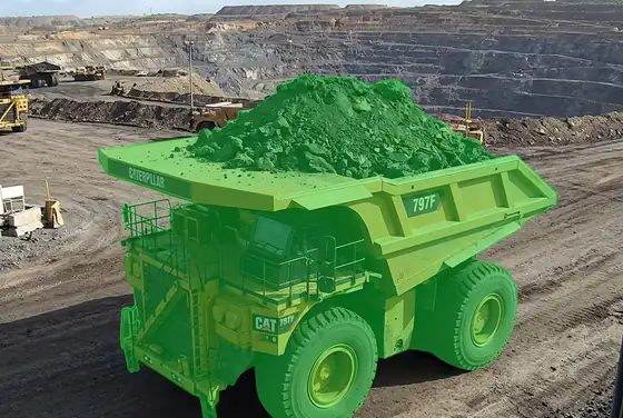 AI segmentation flagging an overloaded haul-truck tray above the design line
