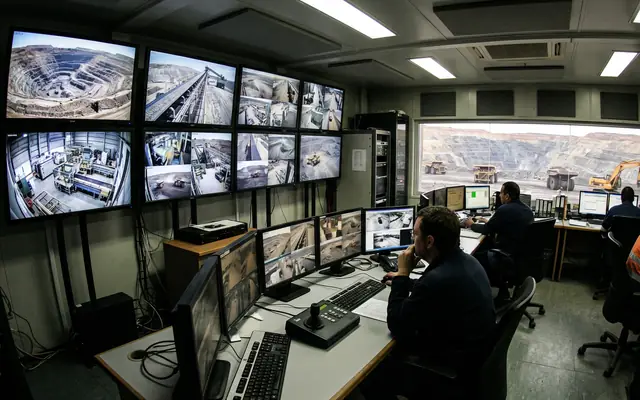 An existing CCTV camera on a building with a small edge-AI box beside it