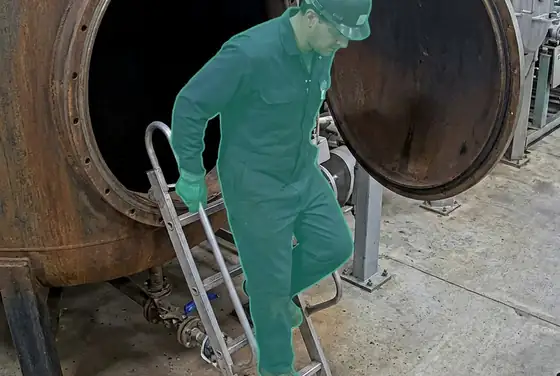 AI segmentation mask flagging a worker entering a vessel without an SCBA