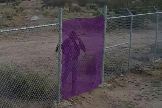 AI segmentation mask highlighting a breach in a remote site perimeter fence