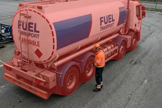 AI segmentation mask highlighting a tanker truck too close to a worker