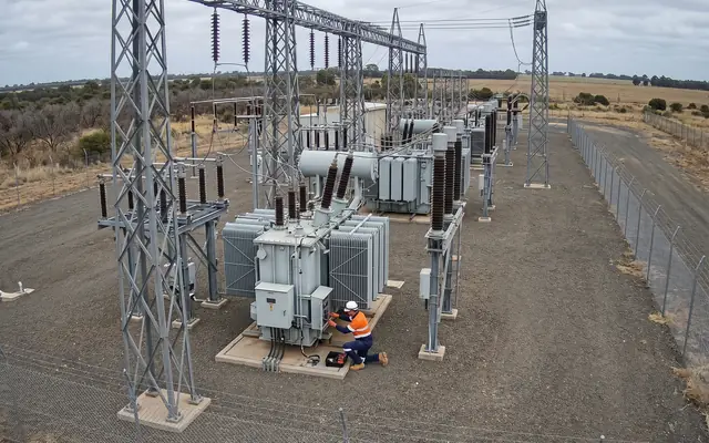 A lone worker climbing down into an underground cable vault without a buddy