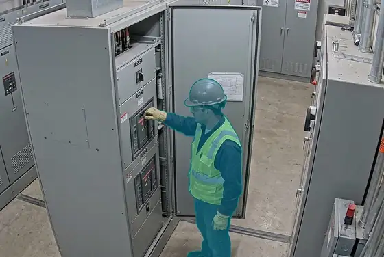 AI segmentation flagging a worker at a switchgear with no arc-rated face shield