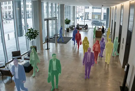 AI segmentation mask on a live count of people across a tower lobby