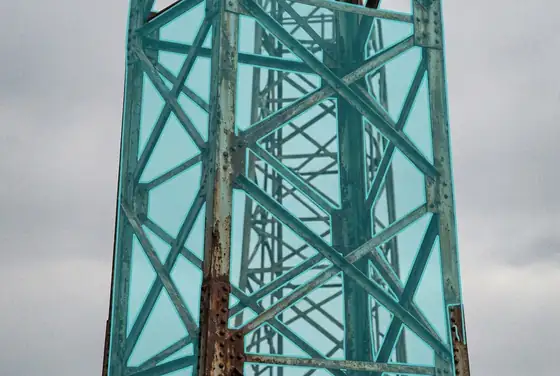 AI segmentation mask on a corroded steel lattice tower shaft