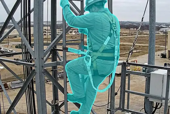 AI segmentation mask flagging a single-lanyard fall-arrest on a climber