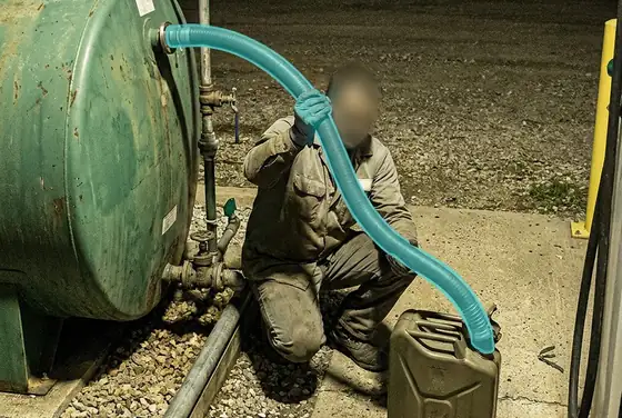 AI segmentation mask on a siphoning hose at a backup diesel tank