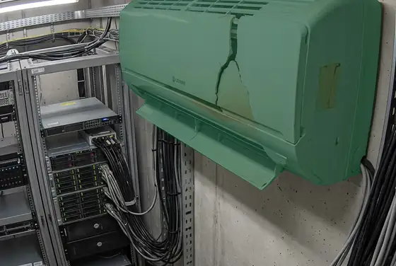 AI segmentation mask on a failed air-conditioning unit inside a BTS shelter