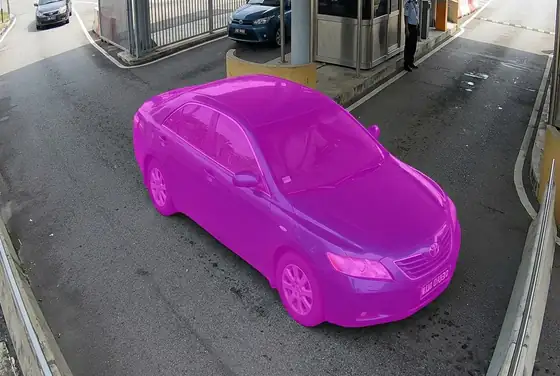 AI segmentation mask flagging a stolen vehicle crossing a checkpoint