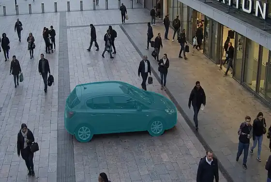 AI segmentation mask flagging a vehicle in a pedestrian-only zone outside a station