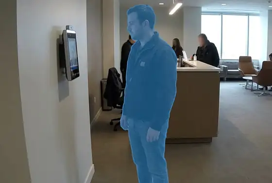 AI segmentation on a worker checking in at a face-recognition terminal